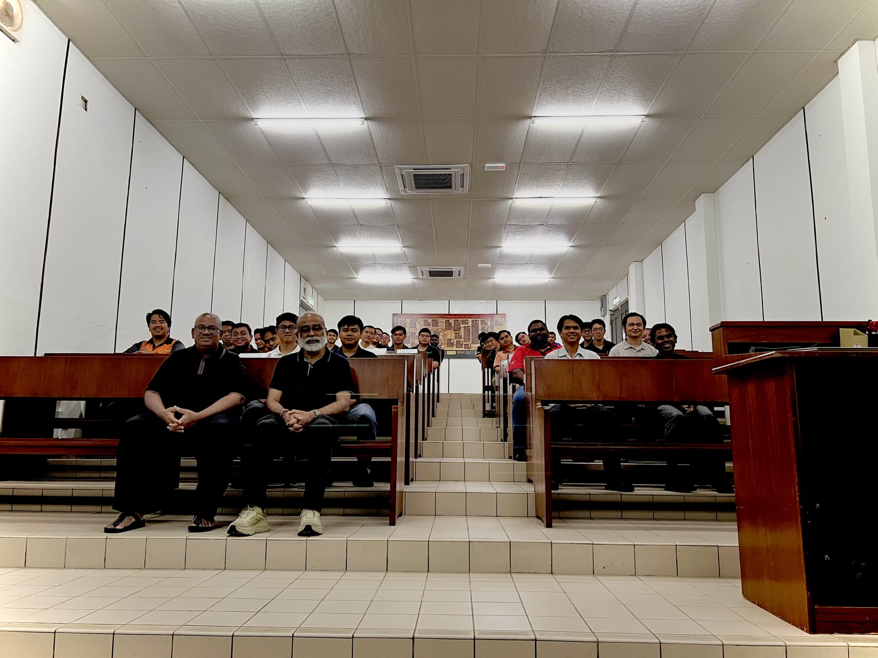 A community gathering inside the College General chapel