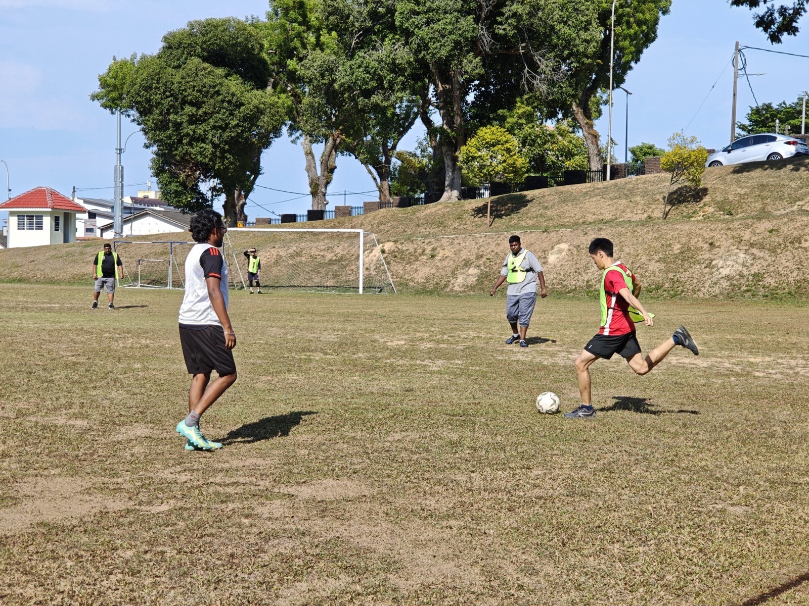 A friendly football match on the seminary field