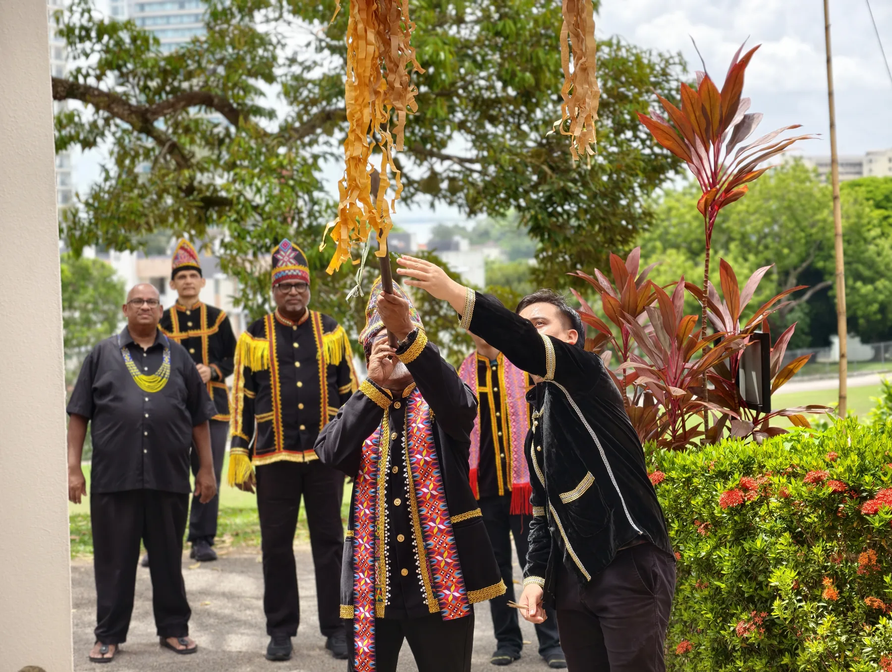 Seminarians in traditional dress at a cultural celebration