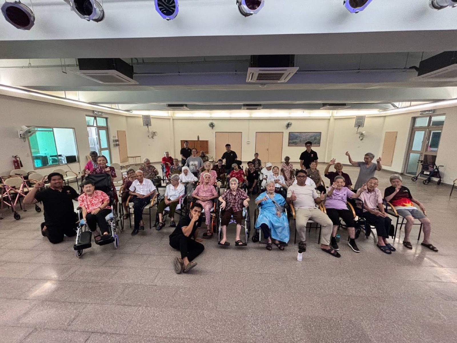 An elderly gathering with the seminarians in the community hall
