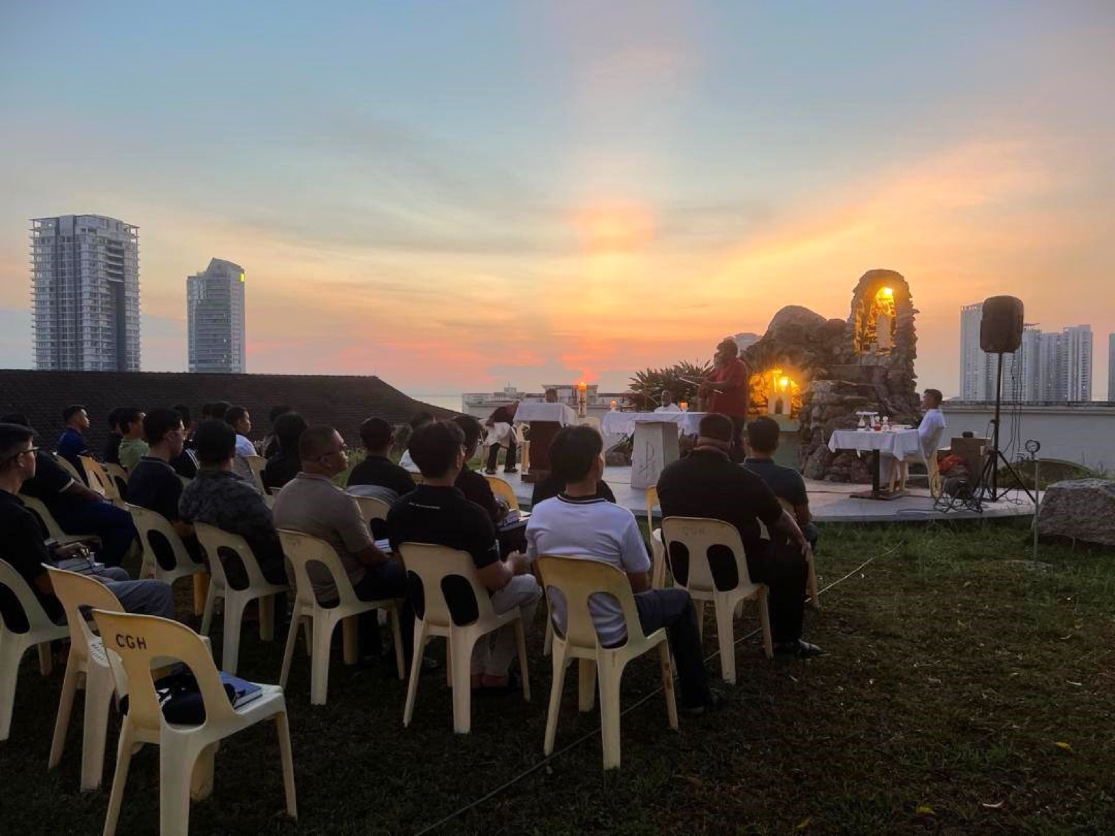 The community gathered for an evening liturgy outdoors