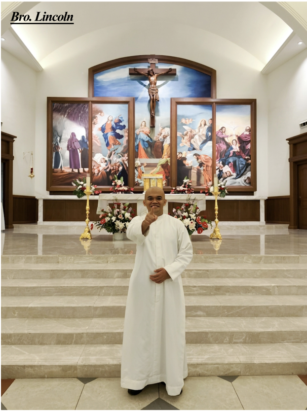 Bro. Lincoln standing in front of the sanctuary at the Church of the Assumption